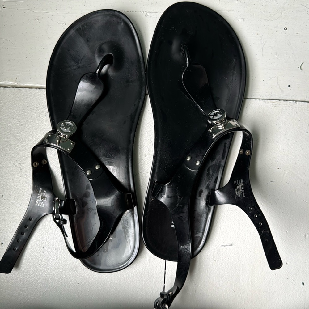 Michael Kors black flip flops silver details